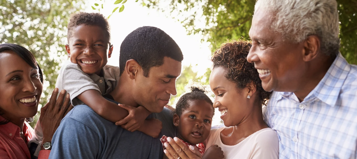Family with multiple generations outside.
